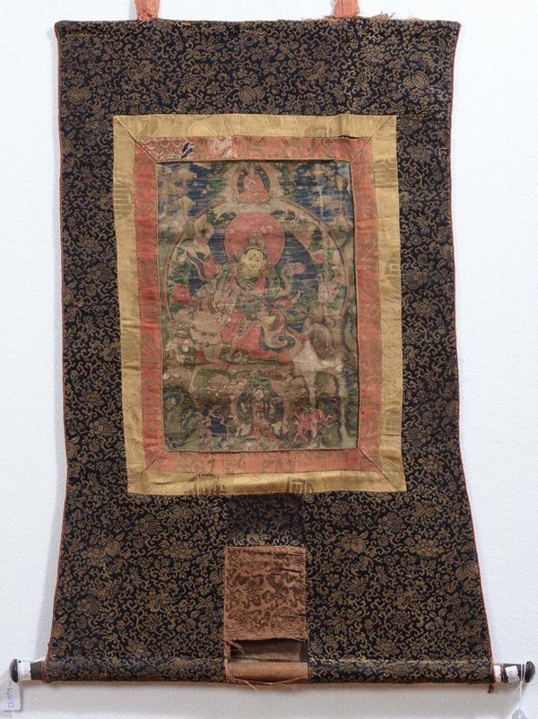A silk scroll depicting a deity, Tibet, 18th century