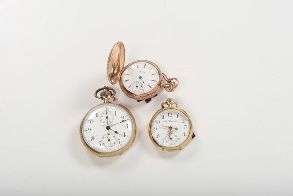 Lotto di tre orologi da tasca in oro di cui due 18 kt e uno 14 kt