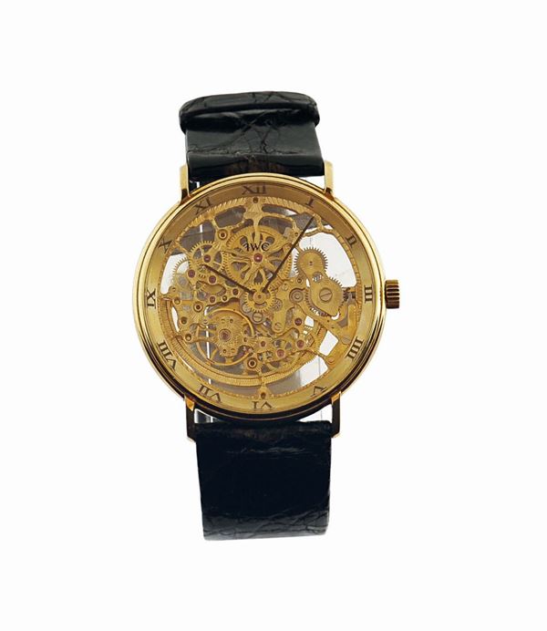 IWC, “International Watch Co”.,“Squelette”, automatico, in oro giallo 18K, con fibbia IWC in oro 18K,  [..]