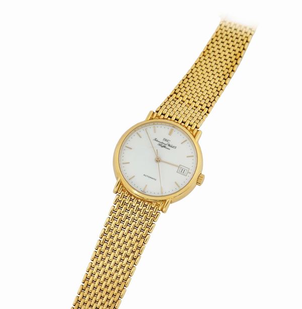 IWC, International Watch Co., Schaffhausen, cassa No.2442811, orologio da polso in oro giallo 18K,automatico, con datario e bracciale IWC in oro giallo 18K.Realizzato nel 1990.