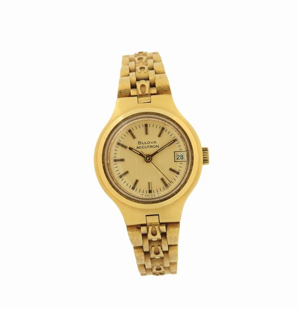 Bulova Accutron, case No. 2-527309, yellow Gold quartz lady's wristwatch with an 18K yellow gold bracelet with deployant clasp.Made in the 1970's.