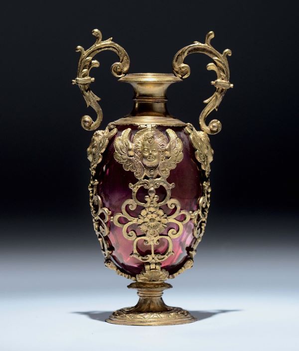 A red glass vase with gilt bronze mounting. Florence or Pisa, late 16th, early 17th century