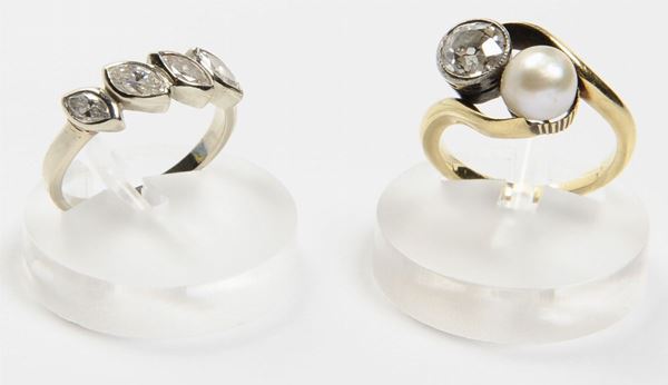A two diamond and pearl ring