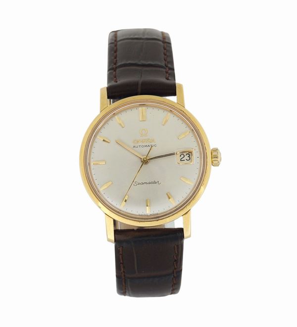 OMEGA, 18K yellow gold, self-winding, water resistant wristwatch with date. Made in the 1960's