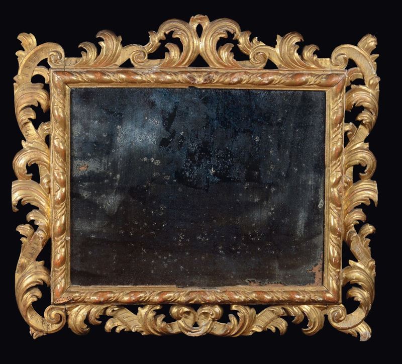 Specchiera in legno intagliato e dorato, XIX secolo  - Asta Arredi dalle dimore degli eredi Ercole Marelli e altre provenienze - Cambi Casa d'Aste