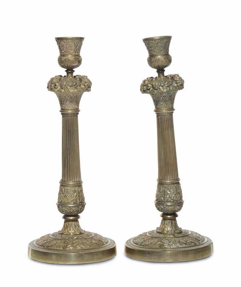 Coppia di candelieri in bronzo dorato, XIX secolo  - Auction Furnishings from the mansions of the Ercole Marelli heirs and other property - Cambi Casa d'Aste