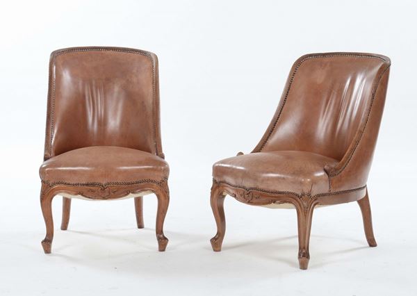Coppia di poltroncine con seduta in pelle, XIX secolo