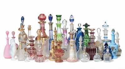 Collezione di Bottiglie in Vetro di Foggie ed Epoche Diverse