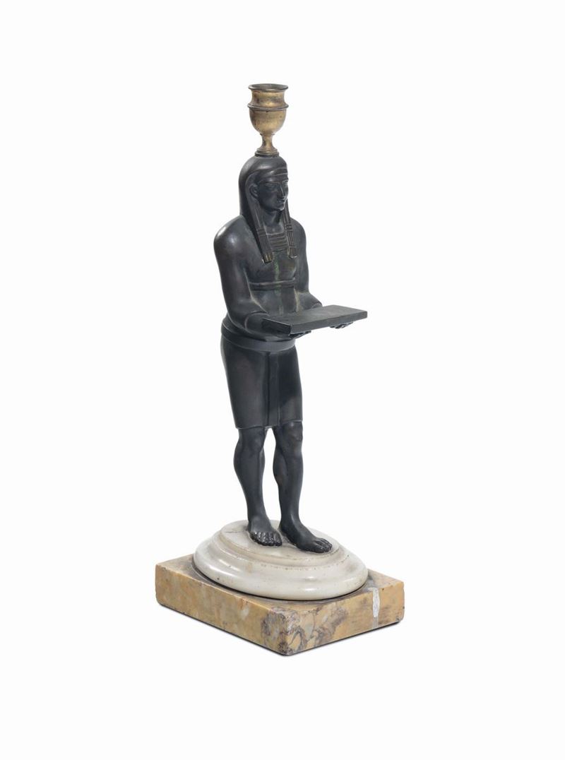 Candelabro in bronzo raffigurante egizio, XIX secolo  - Asta Arredi dalle dimore degli eredi Ercole Marelli e altre provenienze - Cambi Casa d'Aste