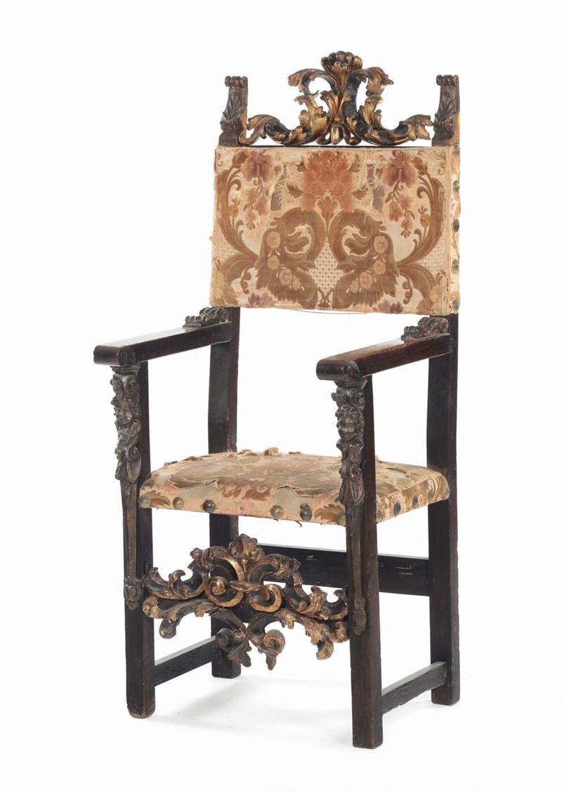 Seggiolone in noce intagliato, XVIII secolo  - Auction Furnishings from the mansions of the Ercole Marelli heirs and other property - Cambi Casa d'Aste