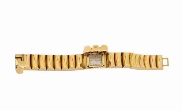 Zenith, 18K yellow gold wristwatch with a solid 18K yellow gold bracelet. Total weight, 80gr. Made in the 1940's.