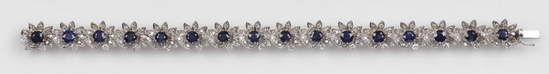 A sapphire and diamond earrings. Mounted in white gold 750/1000  - Auction Fine Jewels - Cambi Casa d'Aste