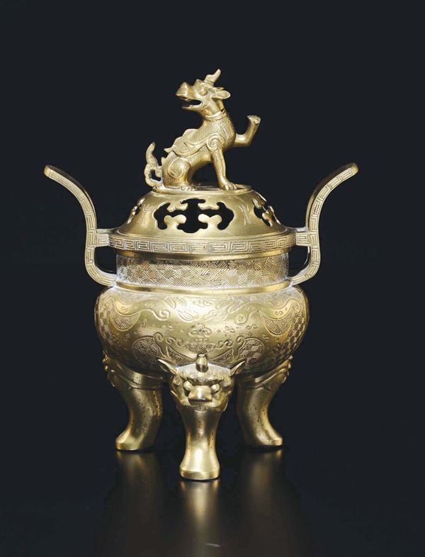 A gilt bronze tripod censer and cover with Pho dog, China, 20th century