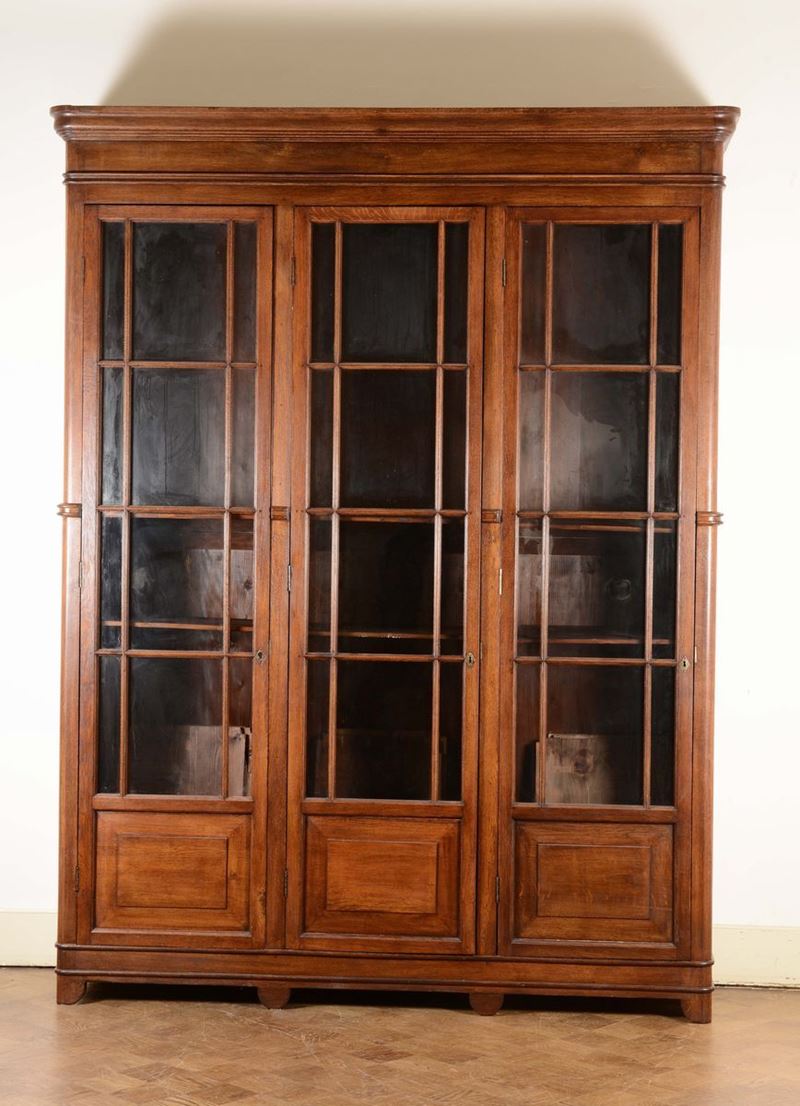 Libreria a tre ante, prima metà XX secolo  - Auction Furnishings from the mansions of the Ercole Marelli heirs and other property - Cambi Casa d'Aste
