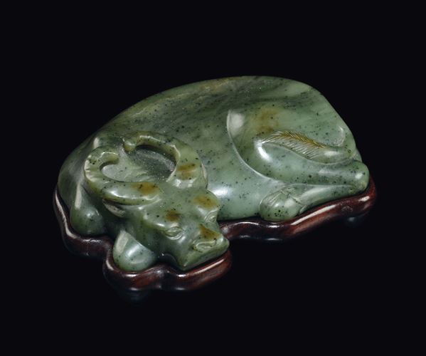 A spinach jade figure of buffalo, China, Qing Dynasty, 18th century