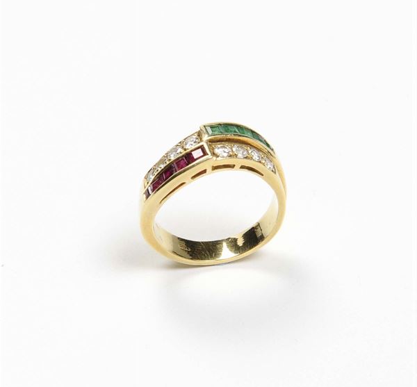 A diamond, emerald and ruby ring