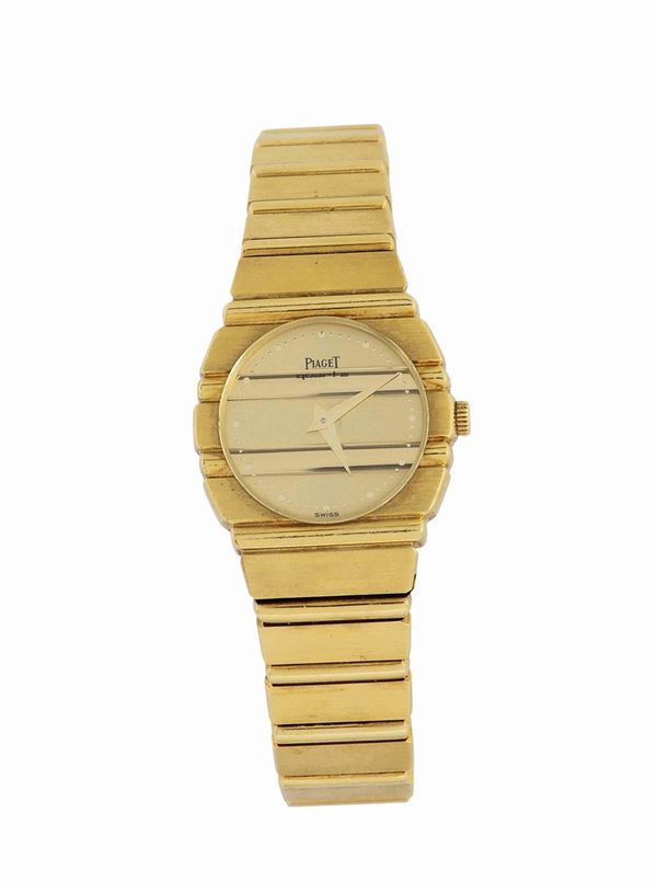 Piaget, No. 861C701, 18K yellow gold quartz lady's wristwatch with an 18K yellow gold bracelet. made in the 1990's.