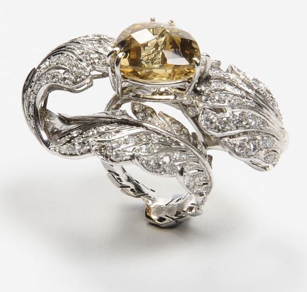 A citrine and gold ring