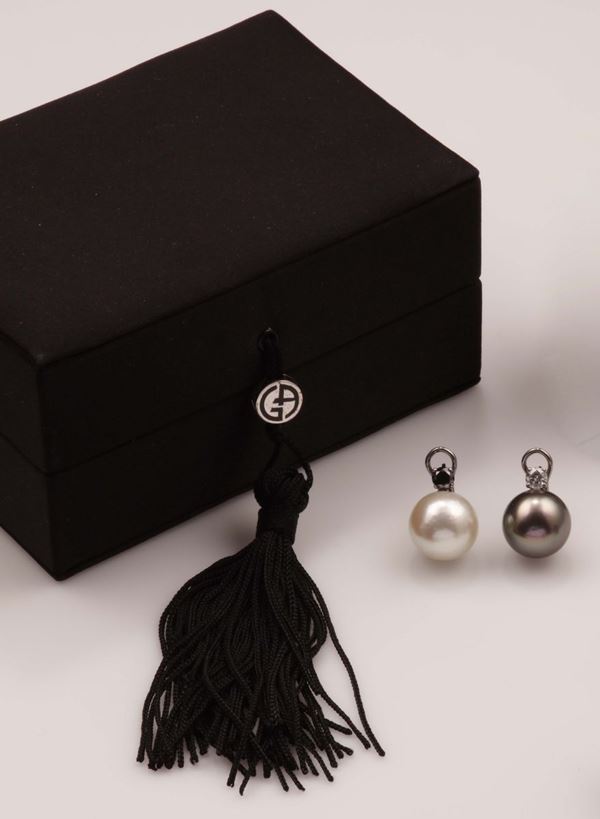 Pair of cultured pearl and diamond earrings. Giorgio Armani