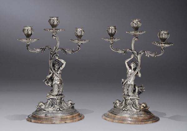 A pair of silver candlesticks with an onyx base, maker Milanesi, 20th century