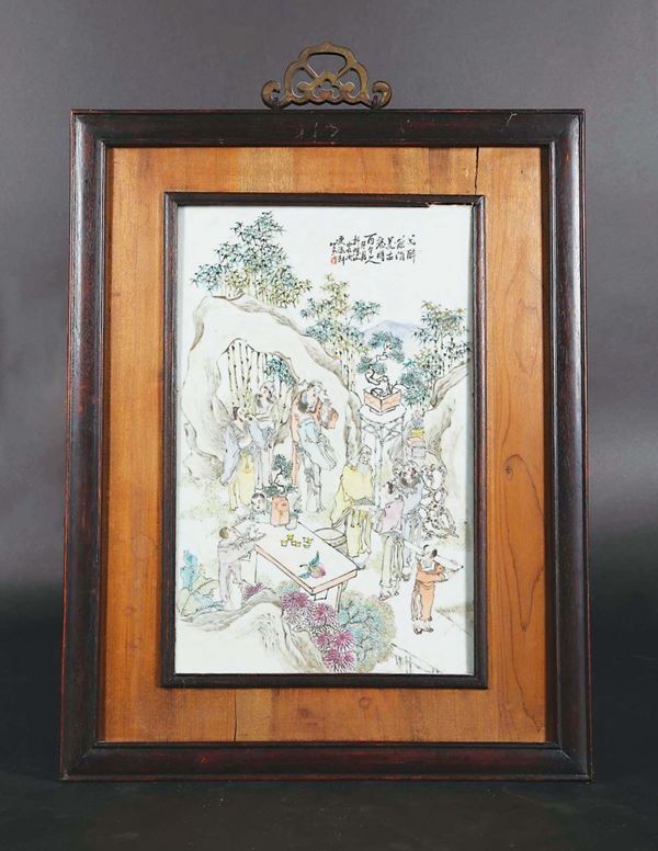 A polychrome enamelled porcelain plaque with common life scenes and inscriptions, China, Qing Dynasty,  [..]