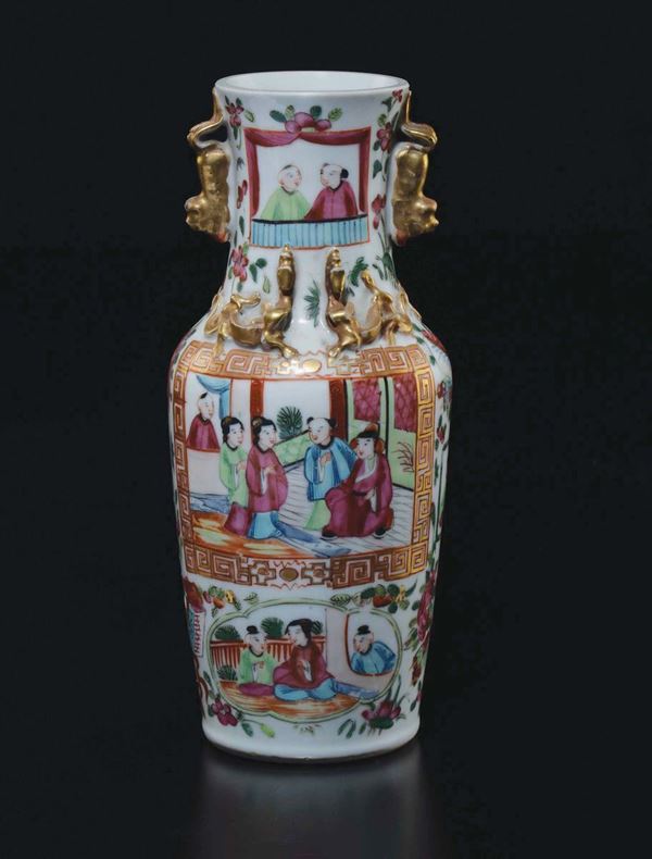 A polychrome enamelled porcelain vase with common life scenes within reserves and gold dragons in relief, China, Qing Dynasty, late 19th century