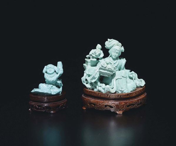 Two turquoise figures of Guanyin with roses and child with vase, China, Qing Dynasty, 19th century