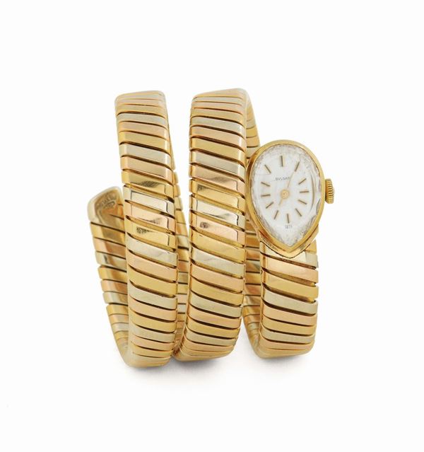 Bulgari, Ref. 1142210, 18K yellow gold lady's  wristwatch with an integrated 18K yellow, pink and white  [..]