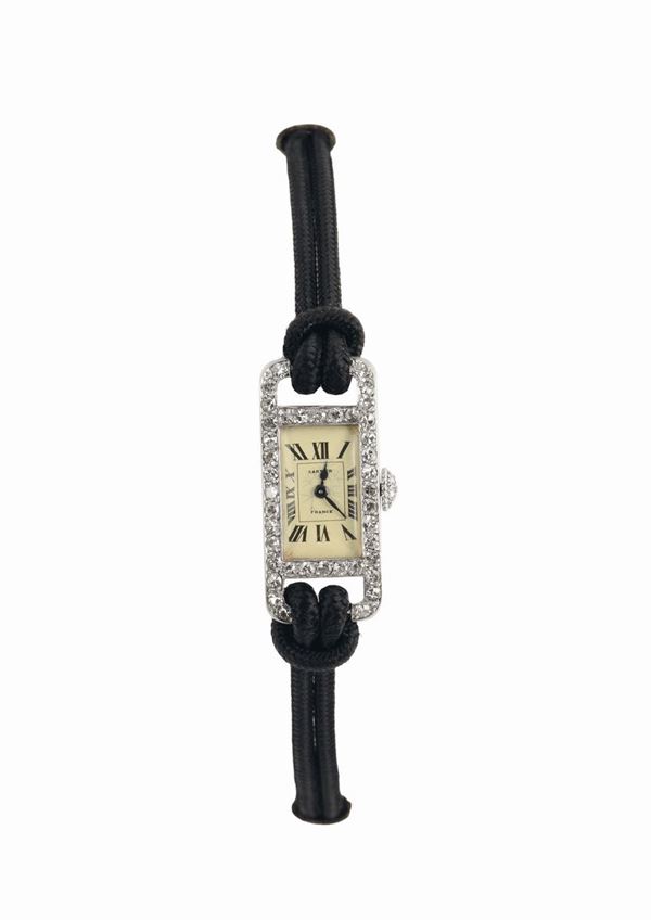 Cartier, France, 18K white gold, Art Deco, wristwatch with diamonds. Made in the 1920's.