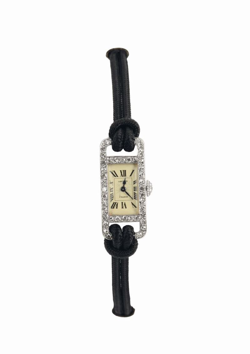 Cartier, France, orologio da donna, stile Art Decò, in oro bianco 18K e brillanti. Realizzato nel 1920.  - Asta Orologi da Polso e da Tasca - Cambi Casa d'Aste