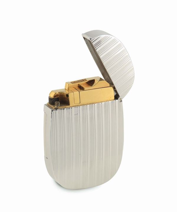 White Gold Lighter Patek Philippe, Genève, No. A089, Ref. 9502G. Made in the 1970s. Fine and very rare, 18K white gold lighter with vertical lines  decorations. Case signed.