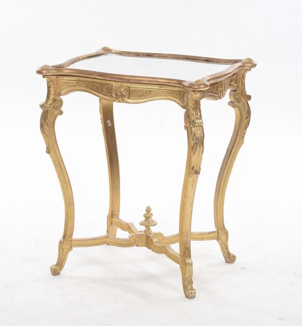 Tavolino in legno dorato con piano a specchio