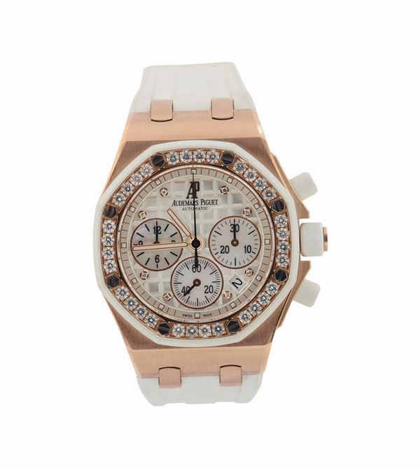 Audemars Piguet, Royal Oak, Offshore, Automatic, No. 657, case No. G15371, Ref. 25986CK. Made circa 2005. Fine, tonneau-shaped, octagonal, self-winding, water resistant, 18K pink gold and white rubber-coated lady's wristwatch with diamond-set bezel, round-button chronograph, registers and date, set and an Audemars Piguet 18K pink gold deployant clasp.