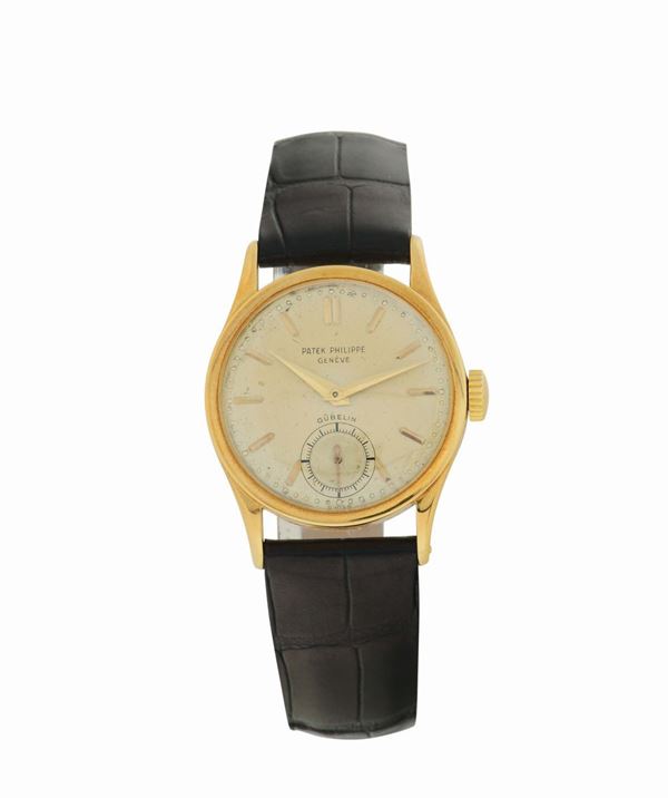 Patek Philippe, Geneve, Gubelin, movement no. 964720, cassa No. 301978, 18K yellow gold wristwatch with an 18K yellow gold buckle. Made in the 1950's.