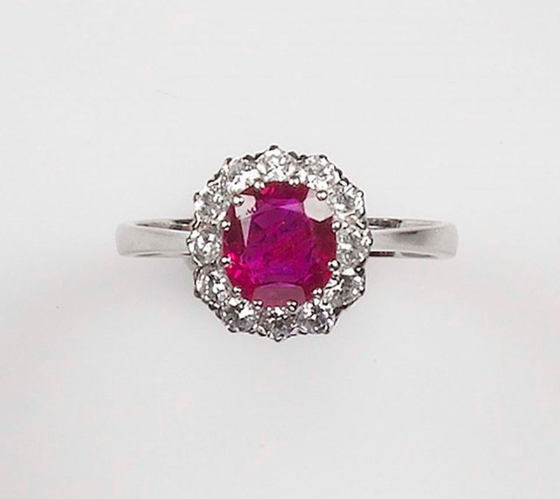 A ruby ad diamond ring. The Myanmar ruby weighing approx. 2,03 carats is set with diamonds and mounted in white gold 750/1000  - Auction Fine Jewels - Cambi Casa d'Aste
