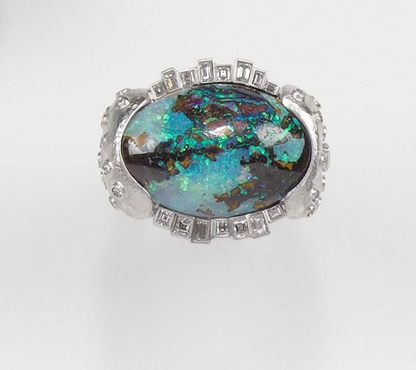 Enrico Cirio, Torino. A  Madre - Luna opal and diamond ring. Mounted in platinum