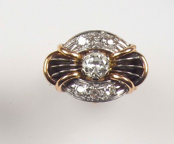 A diamond ring. The old-cut diamond weighing approx. 0,80 carats is mounted in yellow and white gold 750/1000. From 1940s