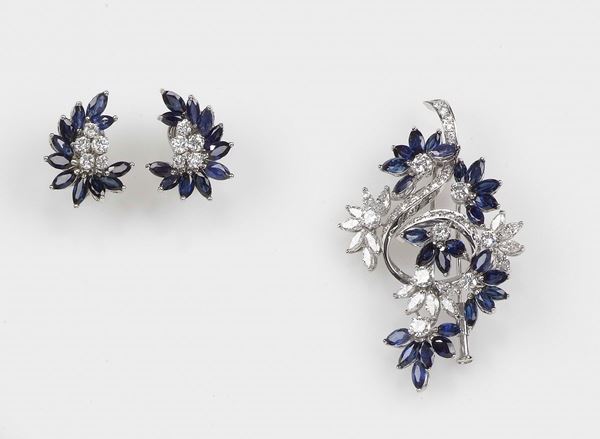 A parure composed of sapphire and diamond brooch and earrings. Mounted in white gold 750/1000