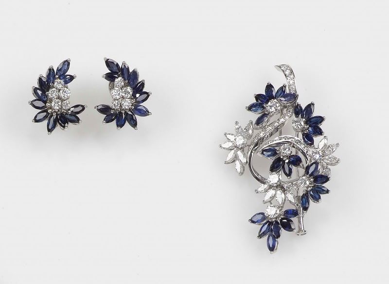 A parure composed of sapphire and diamond brooch and earrings. Mounted in white gold 750/1000  - Auction Fine Jewels - Cambi Casa d'Aste