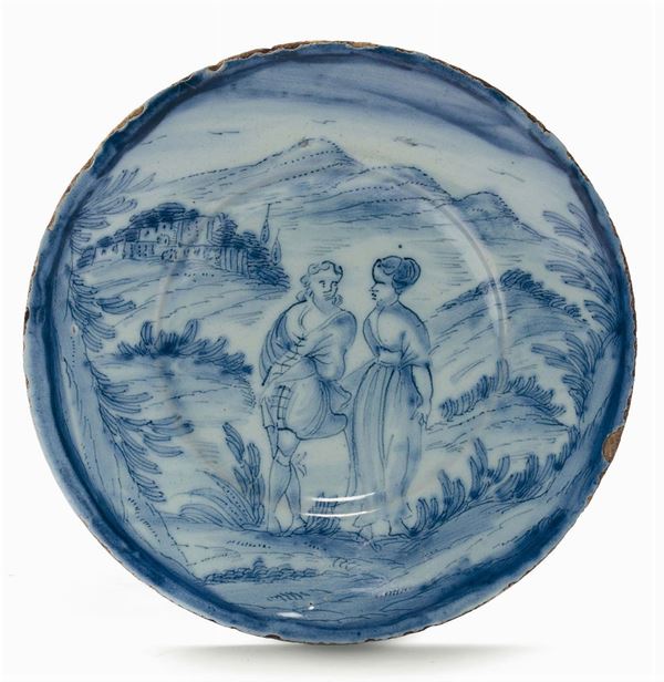 Piatto in maiolica decorato “a scenografia barocca”, Savona XVIII secolo