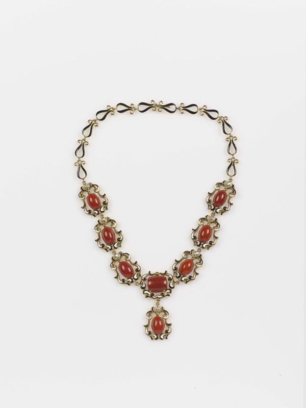 A coral and enamel necklace