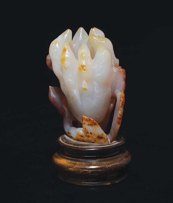 A white and russet jade lotus flower, China, Qing Dynasty, 19th century
