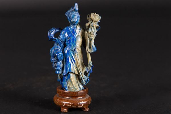 A small lapis lazuli and russet figure of Guanyin, China, 20th century
