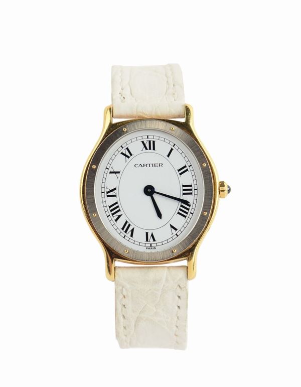 Cartier, Paris, orologio di forma ovale, da donna, in oro giallo 18K, con deployante in oro giallo 18K firmata Cartier. Realizzato nel 1990.