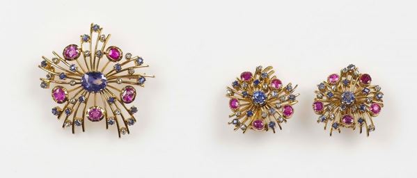 A parure composed of brooch and sapphire, rubies and diamond earrings