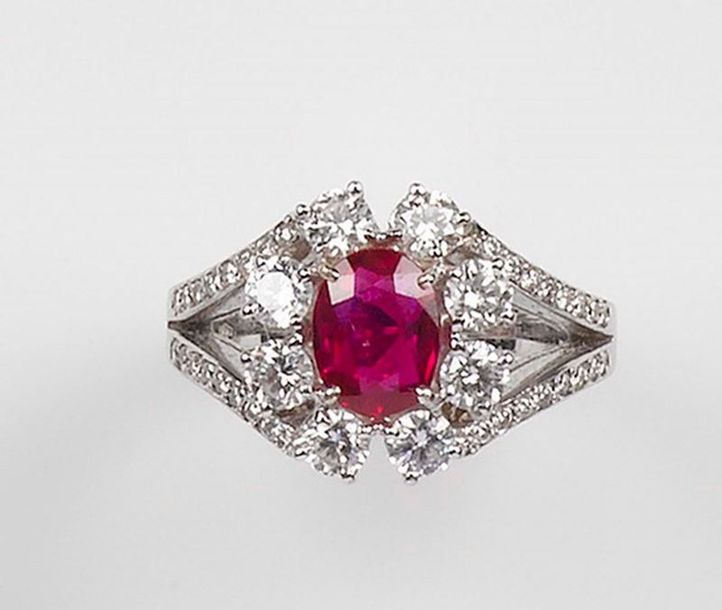 A ruby and diamond ring. The heated ruby weighing 1,80 carats is set with diamonds and mounted in white gold 750/1000. Accompanied by a CISGEM analysis  - Auction Fine Jewels - Cambi Casa d'Aste