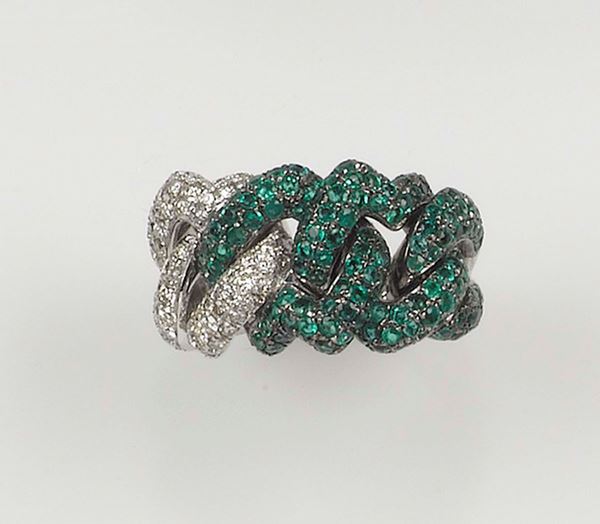 An emerald and diamond gourmette ring