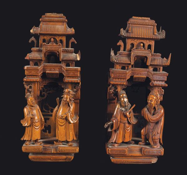 Two carved fruit wood temples with figures, China, Qing Dynasty, 19th century