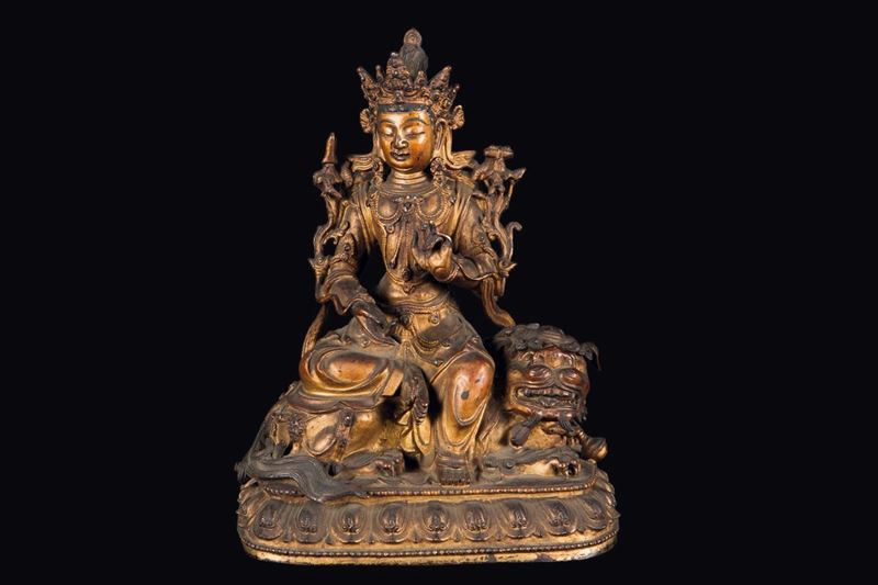 A semi-gilt bronze figure of Simhanada-Avalokitesvara seated on a Pho dog, China, Ming Dynasty, 17th century  - Auction Fine Chinese Works of Art - Cambi Casa d'Aste
