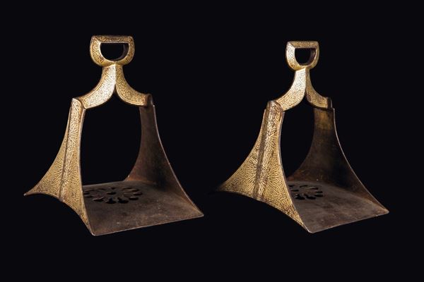 A pair of gilt bronze stirrups, China, Qing Dynasty, 19th century